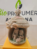 Candela a forma di presepe